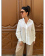 Chemise blanche avec noeud dans le dos